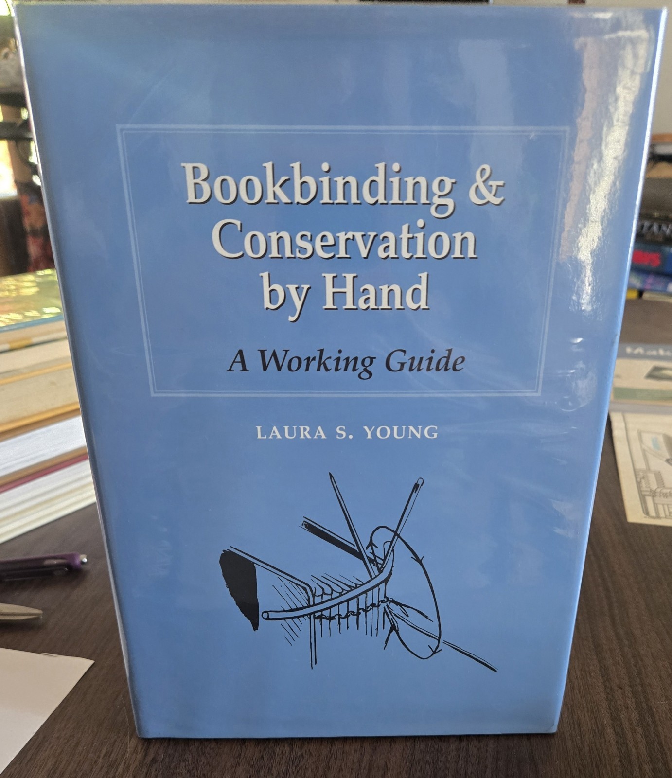 Bookbinding and Conservation by Hand: A Working Guide by Laura Young HCDJ